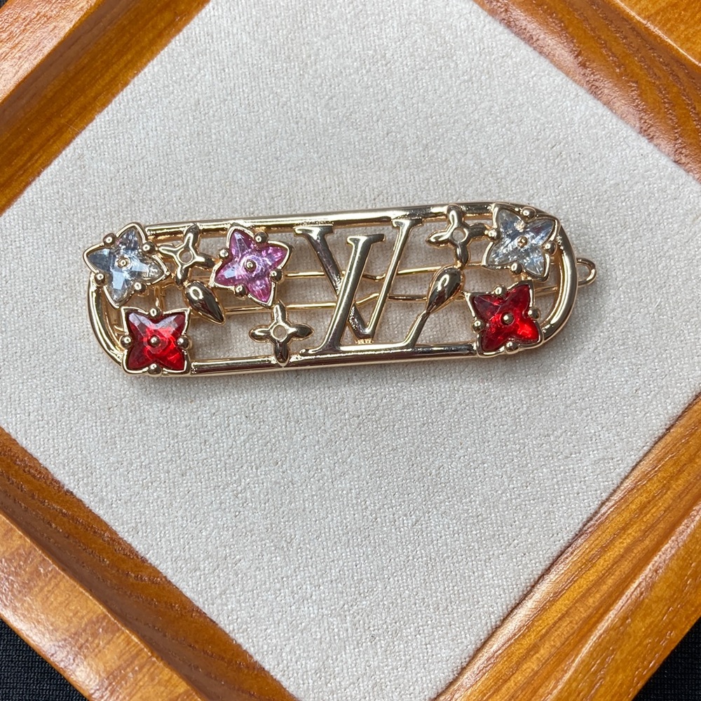 Louis Vuitton Gold Hair Clip with Red, Pink, and Silver Stars